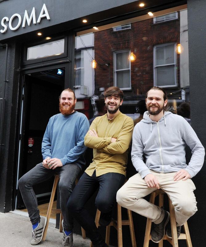 Alex Bruce, (centre) owner, Soma Coffee Co.; Alex Sampson (left) and Matt von Zweigbergk, coffee roasters, pictured outside the Soma Coffee Company, Tuckey St. Picture Denis Minihane.