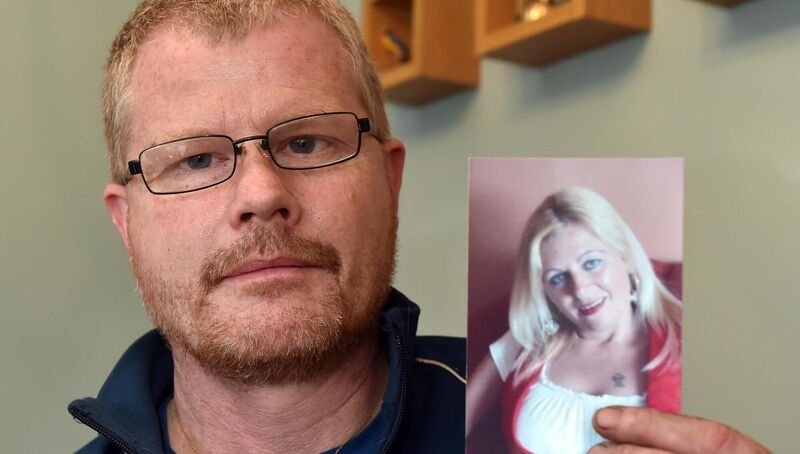 Richard Satchwell holding up a photo of Tina at their home in Youghal yesterday.Picture: Eddie O'Hare