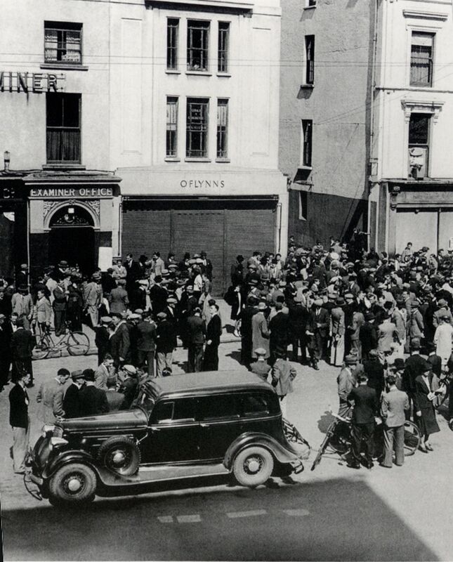 Outside the offices on Patrick Street, May 1940. Crowds wait for copies of the Evening Echo for news of World War II. Outside the offices on Patrick Street, May 1940. Crowds wait for copies of the Evening Echo for news of World War II.