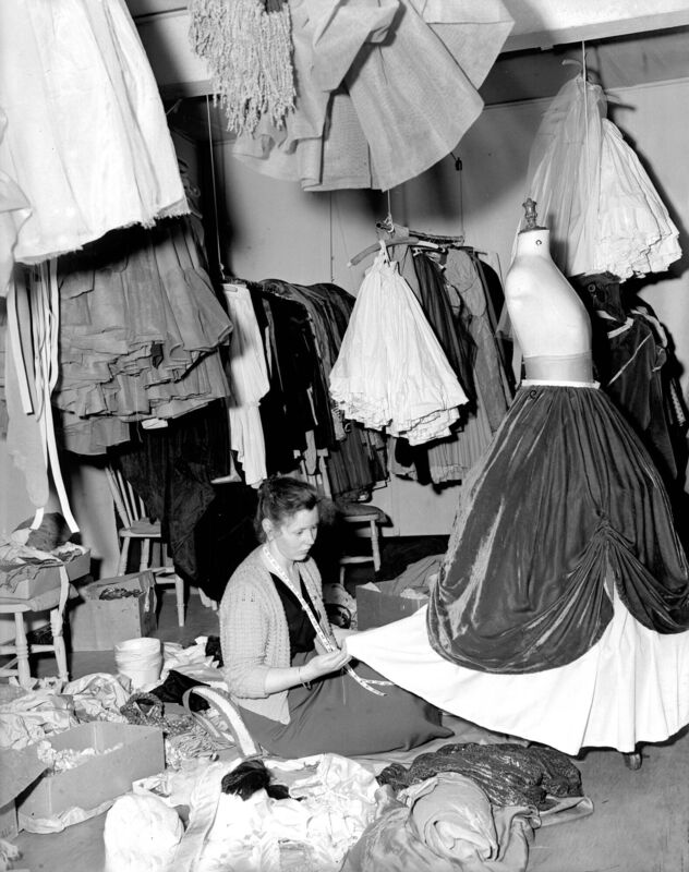 A seamstress at work at the Joan Denise Moriarty Ballet Studio, Emmet Place, Cork in 1957.