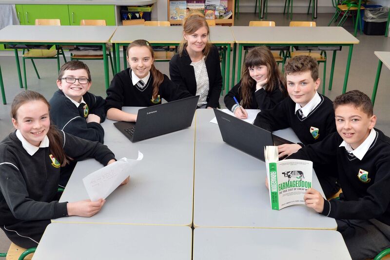 Róisín Ní Cheallaigh, múinteoir, with the debating team members (from left) Isibéal Nestor, Micheál Ó Lafán, Róisín Ní hAodha, Áine Ní Riain, Senan Ó Gliasáin and Riain Mac Conchoille.Picture Denis Minihane.