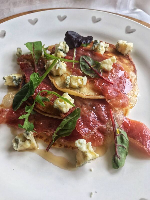 Buttermilk Pancakes with Serrano ham, blue cheese and maple syrup. Picture: Di Curtin