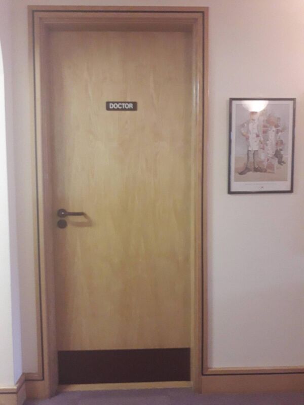 Austin Kelly's contribution to the PhotoVoice exhibition. Titled: "Balance: Black Forest Hot chocolate and my Doctor's office door." Austin Kelly's contribution to the PhotoVoice exhibition. Titled: "Balance: Black Forest Hot chocolate and my Doctor's office door."