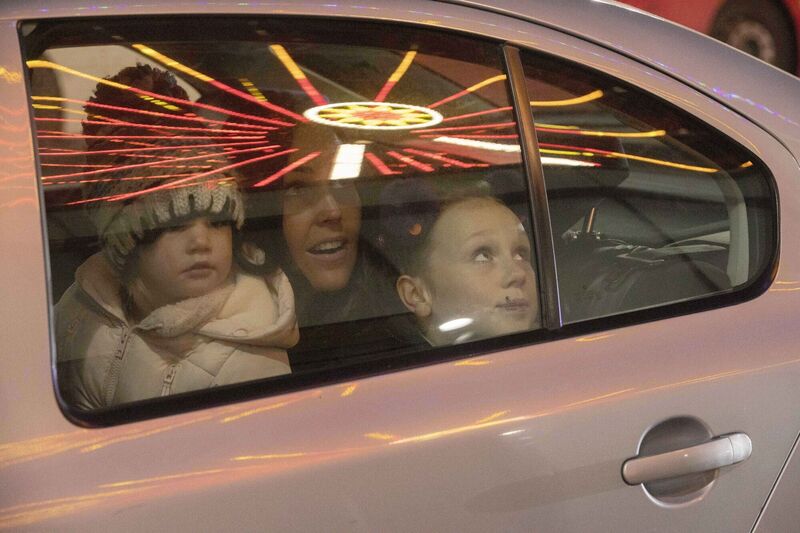 Aileen Arthur with her daughters Zoe bell Arthur and Emily Arthur arrive at Glow on Grand Parade and admire the big wheel. Picture Clare Keogh Aileen Arthur with her daughters Zoe bell Arthur and Emily Arthur arrive at Glow on Grand Parade and admire the big wheel. Picture Clare Keogh