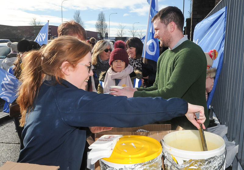 Aisling Fox and Ben Aherne of Flannery's Bar, with soup for nurses during their strike at Cork University Maternity Hospital. Picture: David Keane. Aisling Fox and Ben Aherne of Flannery's Bar, with soup for nurses during their strike at Cork University Maternity Hospital. Picture: David Keane.