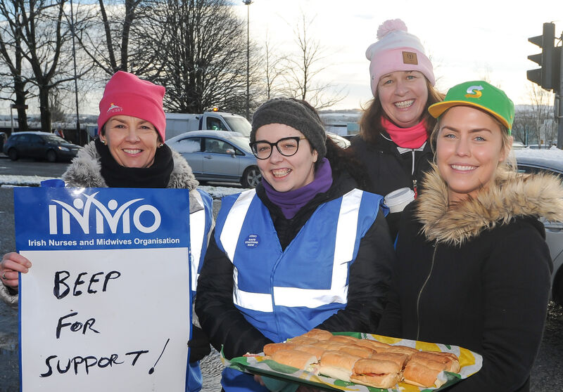 Katie Flannery of Subway with some food for nurses Liz Ryan, Michelle O'Dwyer and Rose Morrissey, during their strike at Cork University Maternity Hospital. Picture: David Keane. Katie Flannery of Subway with some food for nurses Liz Ryan, Michelle O'Dwyer and Rose Morrissey, during their strike at Cork University Maternity Hospital. Picture: David Keane.