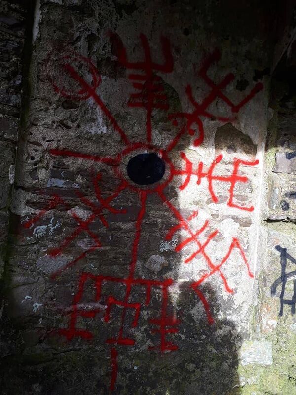 Graffiti spray-painted onto the walls of the 1788 church in Templebreedy, Crosshaven Graffiti spray-painted onto the walls of the 1788 church in Templebreedy, Crosshaven