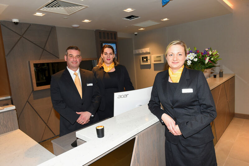Hotel reception staff John Delea; Katie Clancy, supervisor and (front right) Sarah Wallace-Condon, reception manager at the Maldron Hotel, South Mall. Pic; Larry Cummins