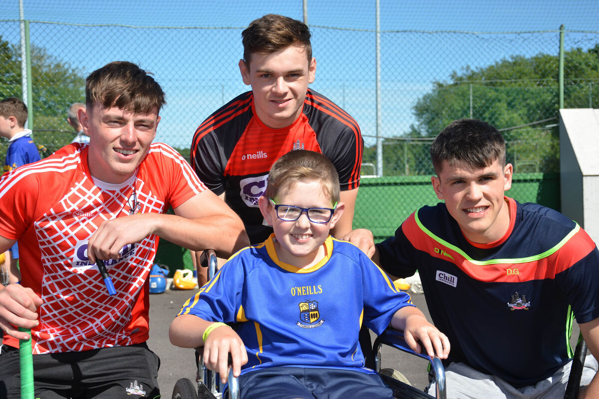 Adam O'Callaghan pictured with Dave Griffin, Mark Coleman and Robbie O'Flynn at the Caman Carrig Fun Day in Carrigaline. Picture: Howard Crowdy