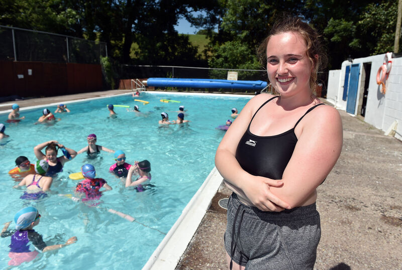 Aoife O'Connor, lifeguard on duty at the community run outdoor swimming pool at Carrignavar (Carrig na BhFear).Picture: Eddie O'Hare
