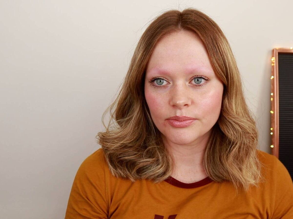 With no eyebrows woman