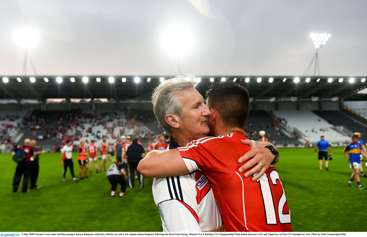 Kieran Kingston celebrates with his son and Cork captain Shane Kingston after the Munster U21 final. Picture: Eóin Noonan/Sportsfile