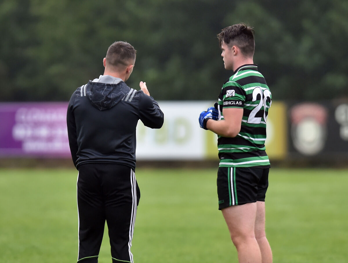 Douglas' Sean Powter has words of advice for Conor Russell. Picture: Eddie O'Hare