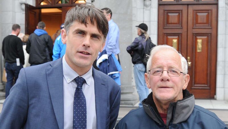Deaglán Ó Deargáin, school principal, (left) and Bertie Dorgan, school caretaker, at a show of support outside City Hall, prior to a meeting of Cork City Council. Picture: Denis Minihane. Deaglán Ó Deargáin, school principal, (left) and Bertie Dorgan, school caretaker, at a show of support outside City Hall, prior to a meeting of Cork City Council. Picture: Denis Minihane.