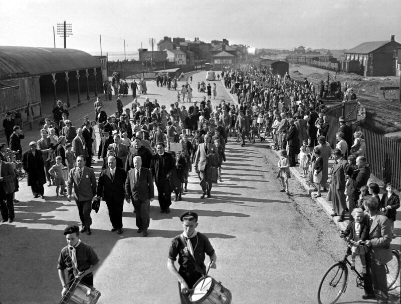 Passengers at Youghal railway station in 1952 Passengers at Youghal railway station in 1952