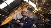 Honing his craft as a knife maker