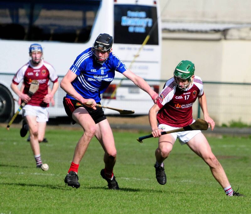 Robert Downey holds off Shane Rowe.