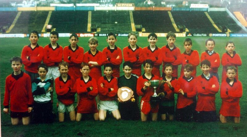 Liam Miller, centre, holding the winning cup in his school days at Ovens NS. Liam Miller, centre, holding the winning cup in his school days at Ovens NS.