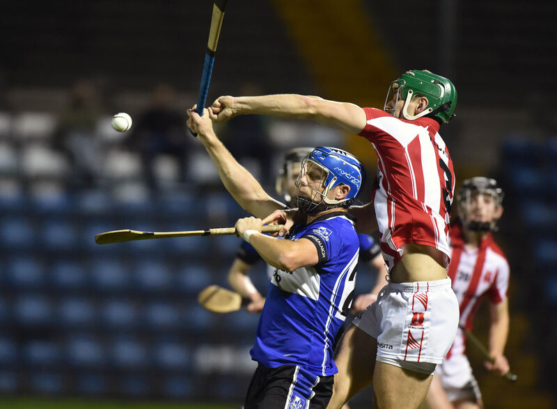 Imokilly's Colm Barry goes high with Sarsfields' Gavin O'Loughlin. Picture: Eddie O'Hare