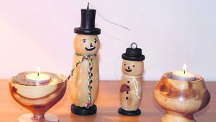 <p>HOME-MADE DECORATIONS: Michael Pattwell’s wooden Christmas ornament</p>