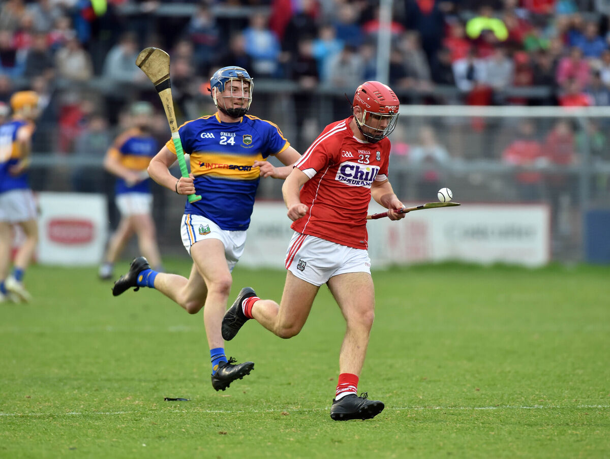 Declan Hanlon racing away from Tipperary's Billy Seymour. Picture: Eddie O'Hare