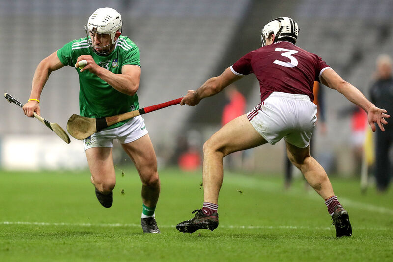Limerick's Aaron Gillane and Daithí Burke of Galway. Picture: INPHO/Laszlo Geczo