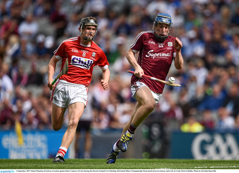Donal Mannion of Galway in action against Daire Connery of Cork in the minor decider. Picture: Seb Daly/Sportsfile