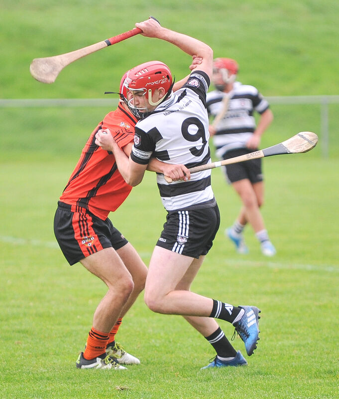 Midleton's Eoin Maloney is tackled by Duhallow's Evan Murphy, during their Premier 1 MHC semi-final at Mallow. Picture: David Keane.