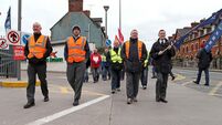 Crippling bus strike heads towards third week as talks continue