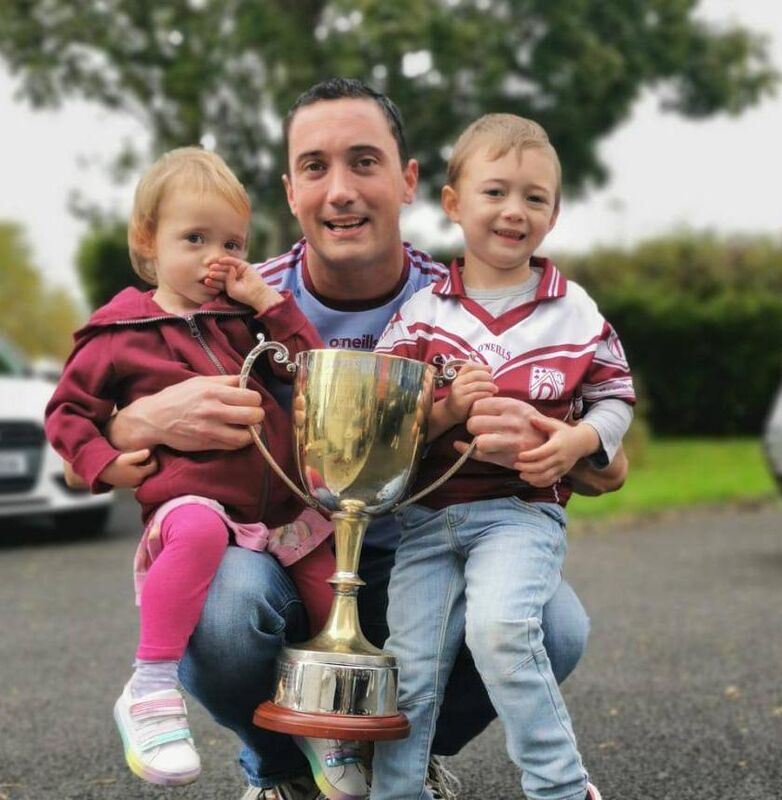 Former Bantry and Cork footballer Kevin Harrington, with his two children. Former Bantry and Cork footballer Kevin Harrington, with his two children.