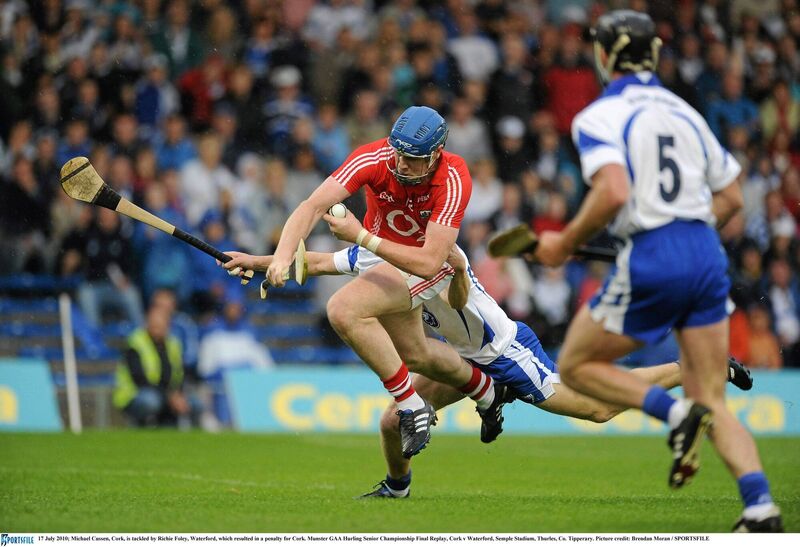 Michael Cussen is fouled for a penalty by Richie Foley, Waterford in 2010. Picture: Brendan Moran/SPORTSFILE
