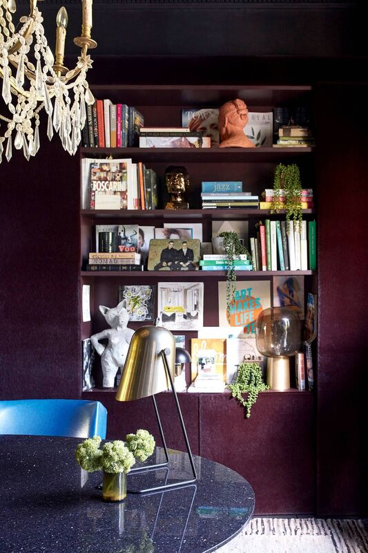  'Fabulous features' - A collection of quirky objects and books turn a dull corner into a feature in Abigail Ahern's home. Picture: Graham Atkins-Hughes/PA