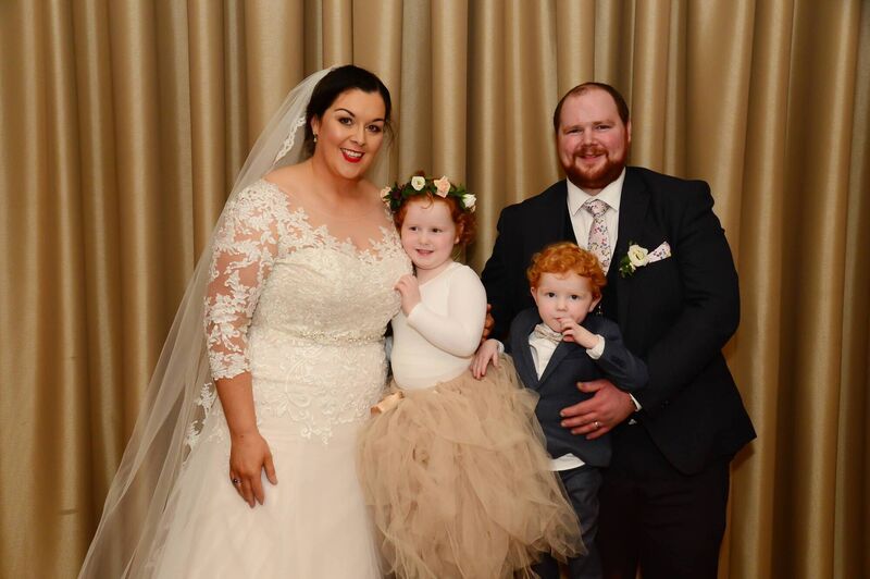 Denise Heslin and Augustine Mc Gilligan with their children on their wedding day, Ciara Lilly and Patrick.