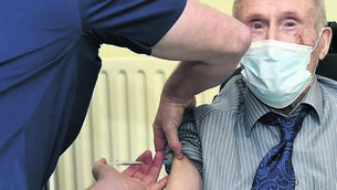 <p class="contextmenu internal_Caption"> John Cremin, 95, of Knocknagree, Co. Cork, a resident at Killarney Community Hospital, gets the Covid-19 vaccination last week.</p>