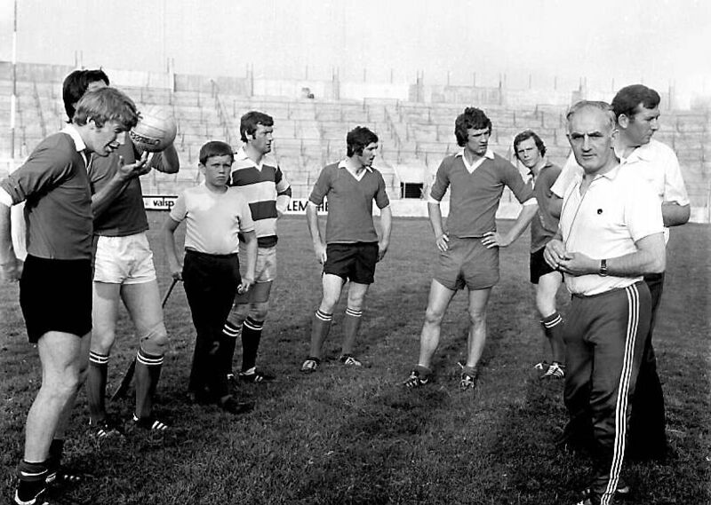 Donie O'Donovan, on the right, with the Cork players.