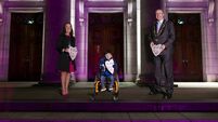 Adam King's 'virtual hug' sign lights up a nation
