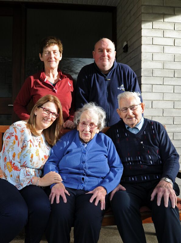 Jimmy and Pat Skinner, Mitchelstown, with three members of their family of six, Jim, Ann (standing) and Tricia. The photo was taken pre-Covid   