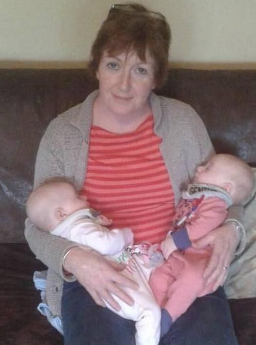 Geraldine Crowley who worked at the Mercy Hospital, pictured with her grandchildren.