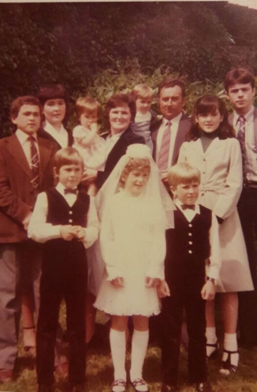 The couple with their young family.