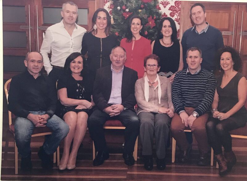 The couple with their family.