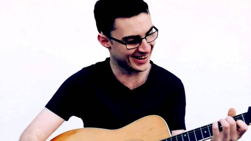 Once tormented by bullies - this singer-songwriter now wants to be a role model for young people with ASD