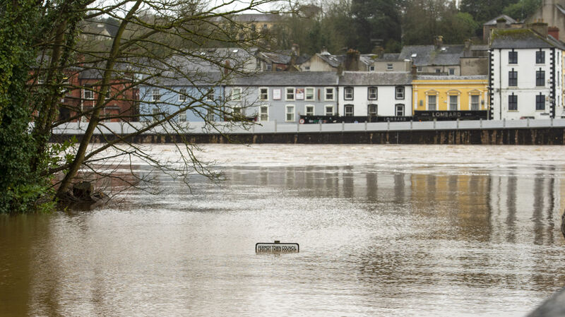 A Fermoy town council sign partly submerged in the floodwater of the River Blackwater in Fermoy, Co Cork. Picture Dan Linehan A Fermoy town council sign partly submerged in the floodwater of the River Blackwater in Fermoy, Co Cork. Picture Dan Linehan