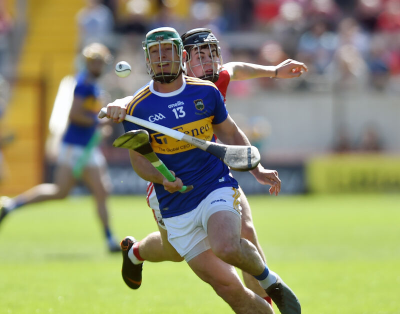 Tipperary's John O'Dwyer is tackled by Cork's Darragh Fitzgibbon. Picture: Eddie O'Hare