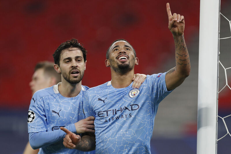 Manchester City's Gabriel Jesus, right, celebrates after scoring his side's second goal in their Champions League match against Borussia Monchengladbach on Wednesday, Picture: AP Photo/Laszlo Balogh