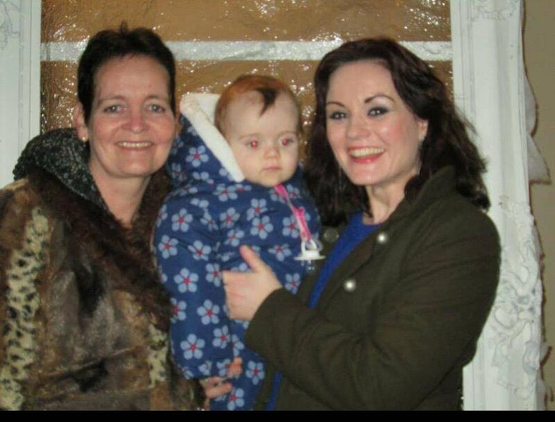 Carol with granddaughter Nola and Bryan's wife Emily. Carol with granddaughter Nola and Bryan's wife Emily.