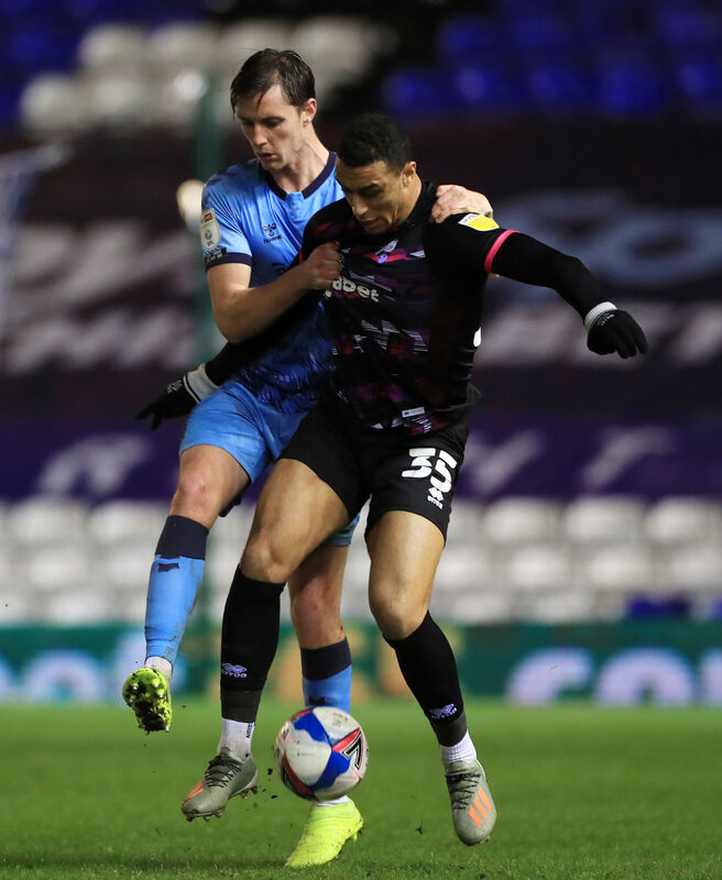 Coventry's Dominic Hyam and Norwich's Adam Idah battle for the ball. Picture: Mike Egerton/PA Wire.