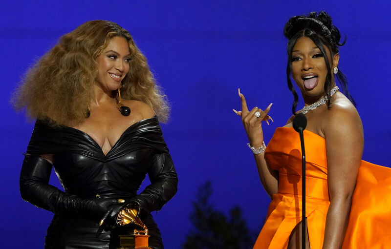 Beyonce, left, and Megan Thee Stallion accept the award for best rap song for "Savage" at the 63rd annual Grammy Awards at the Los Angeles Convention Center last night. (AP Photo/Chris Pizzello) Beyonce, left, and Megan Thee Stallion accept the award for best rap song for "Savage" at the 63rd annual Grammy Awards at the Los Angeles Convention Center last night. (AP Photo/Chris Pizzello)
