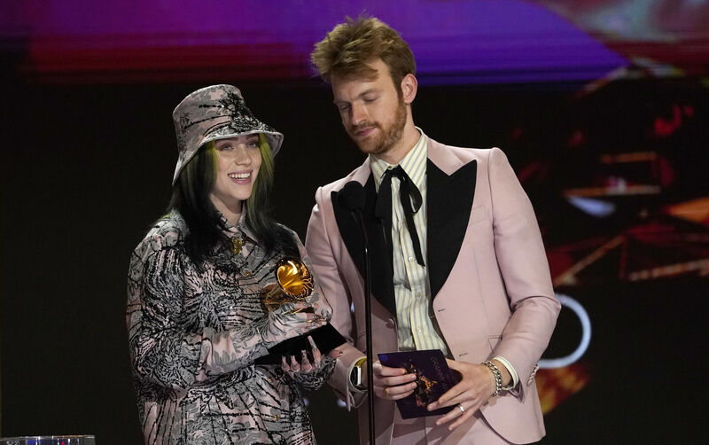 Billie Eilish, left, and Finneas accept the award for record of the year for "Everything I Wanted". Picture: AP Photo/Chris Pizzello Billie Eilish, left, and Finneas accept the award for record of the year for "Everything I Wanted". Picture: AP Photo/Chris Pizzello