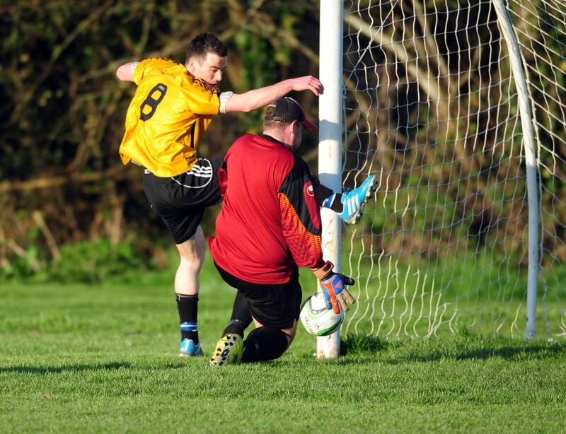 College Corinthians' John Quirke battling Glasheen goalkeeper Paddy Kenneally in 2014. Picture: Eddie O'Hare