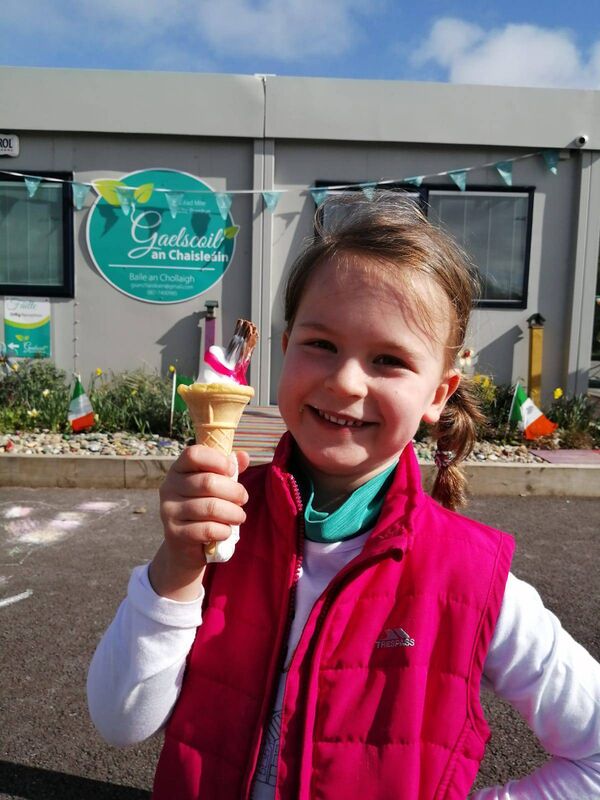 A pupil at Gaelscoil an Chaisleáin, Tanner Park, Ballincollig enjoying sunshine and ice cream at school ahead of St Patrick's Day.